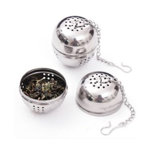 Stainless steel tea infuser with chain for loose leaf tea brewing.